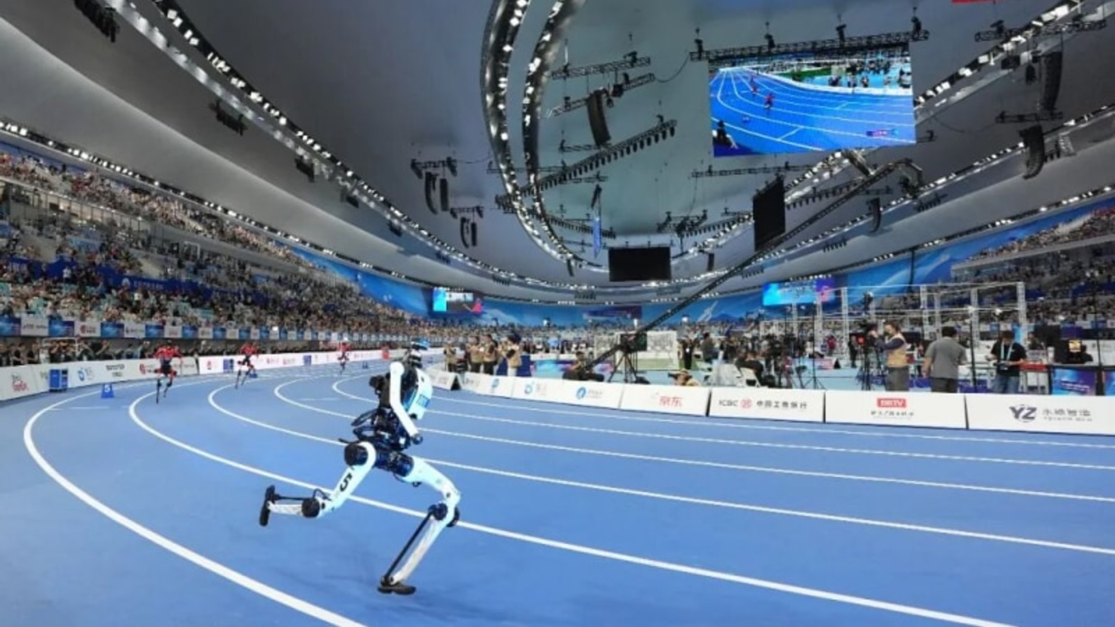 Humanoid robot running the 100-metre event at the 2026 World Humanoid Robot Games in Beijing